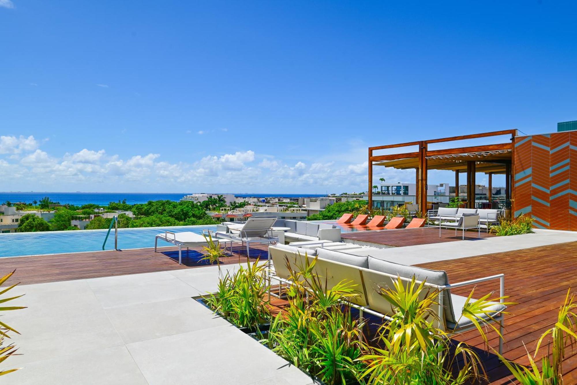 Aloft Playa Del Carmen Hotel Екстериор снимка Rooftop pool at the Grand at Moon Palace