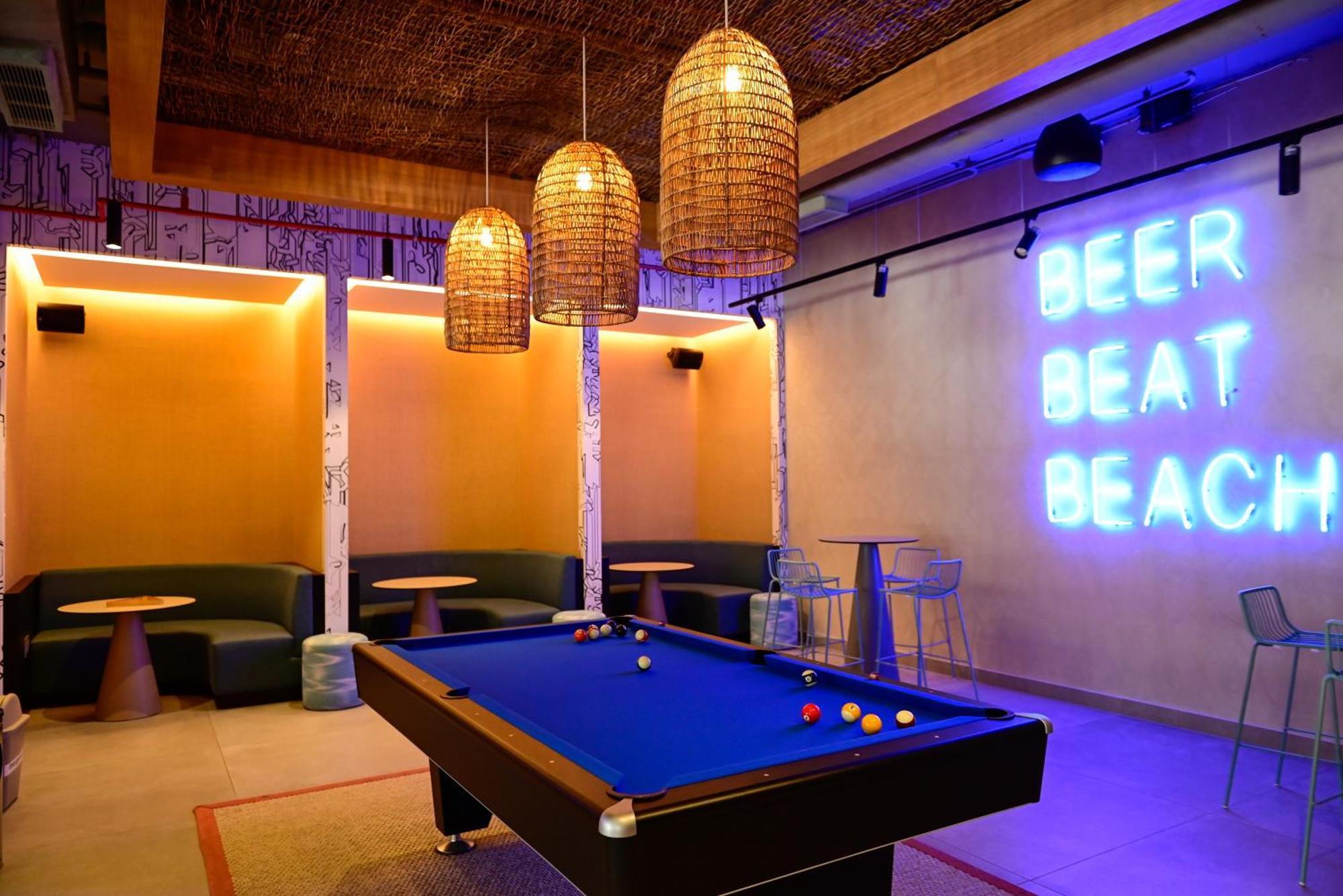 Aloft Playa Del Carmen Hotel Екстериор снимка The interior of the bar